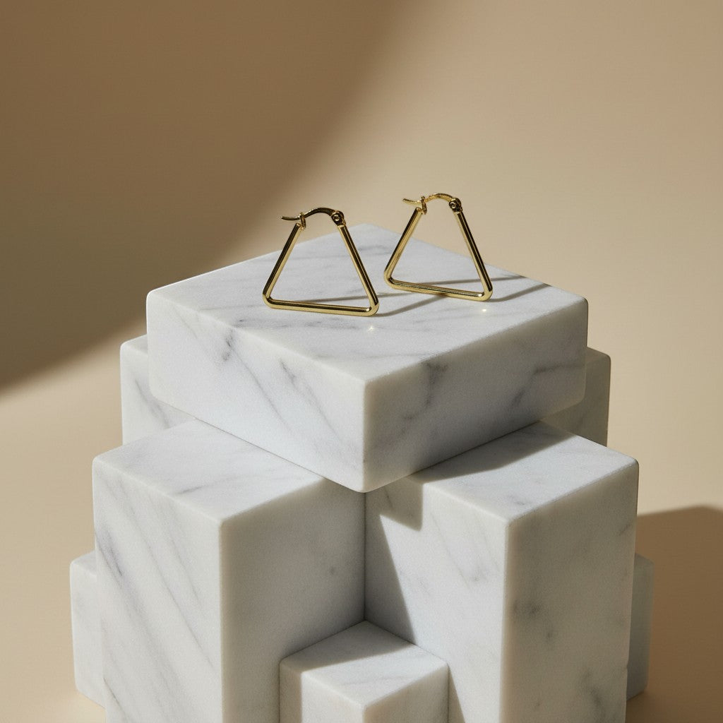 SVORA minimalist gold triangle hoop earrings made of stainless steel with 18K gold plating.