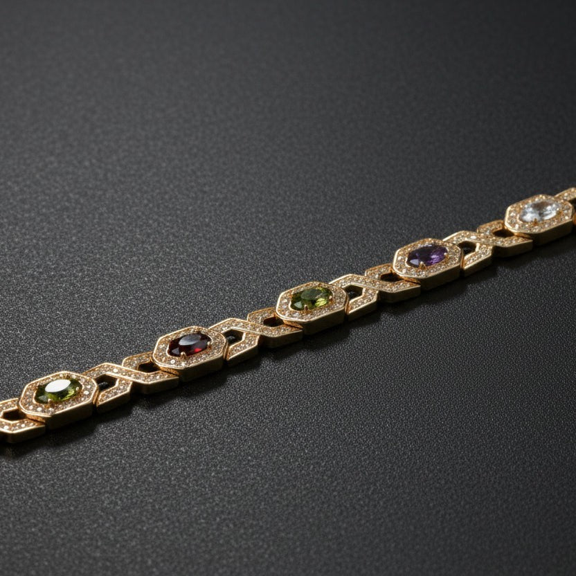 SVORA multicolor halo bracelet with oval CZs in shifting colours on rose gold plated stainless steel. Features hexagonal links and a fold-over clasp.