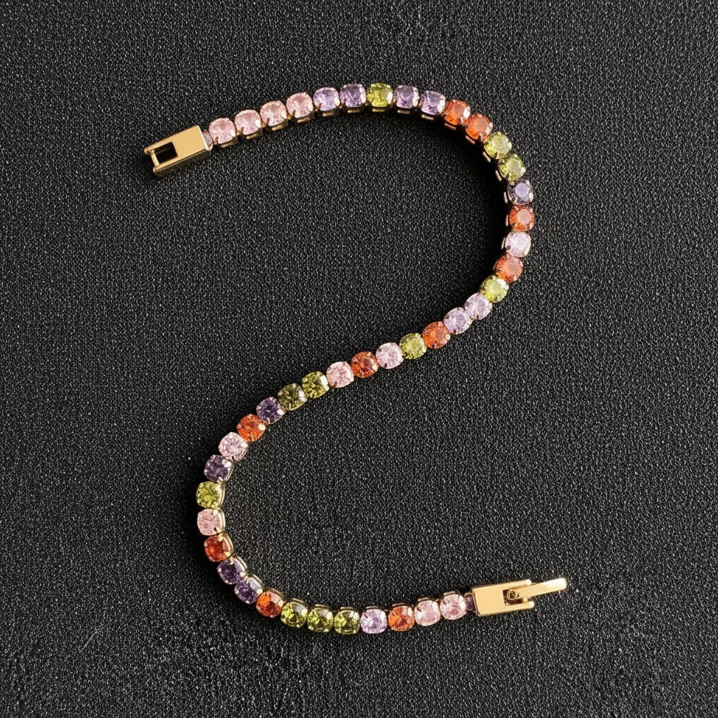 SVORA multicolor tennis bracelet with colorful crystals and gold clasp, made of stainless steel.