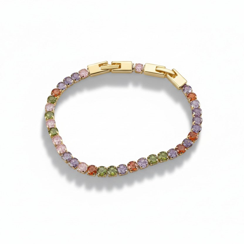 SVORA multicolor tennis bracelet with colorful crystals and gold-tone clasp, made of stainless steel.