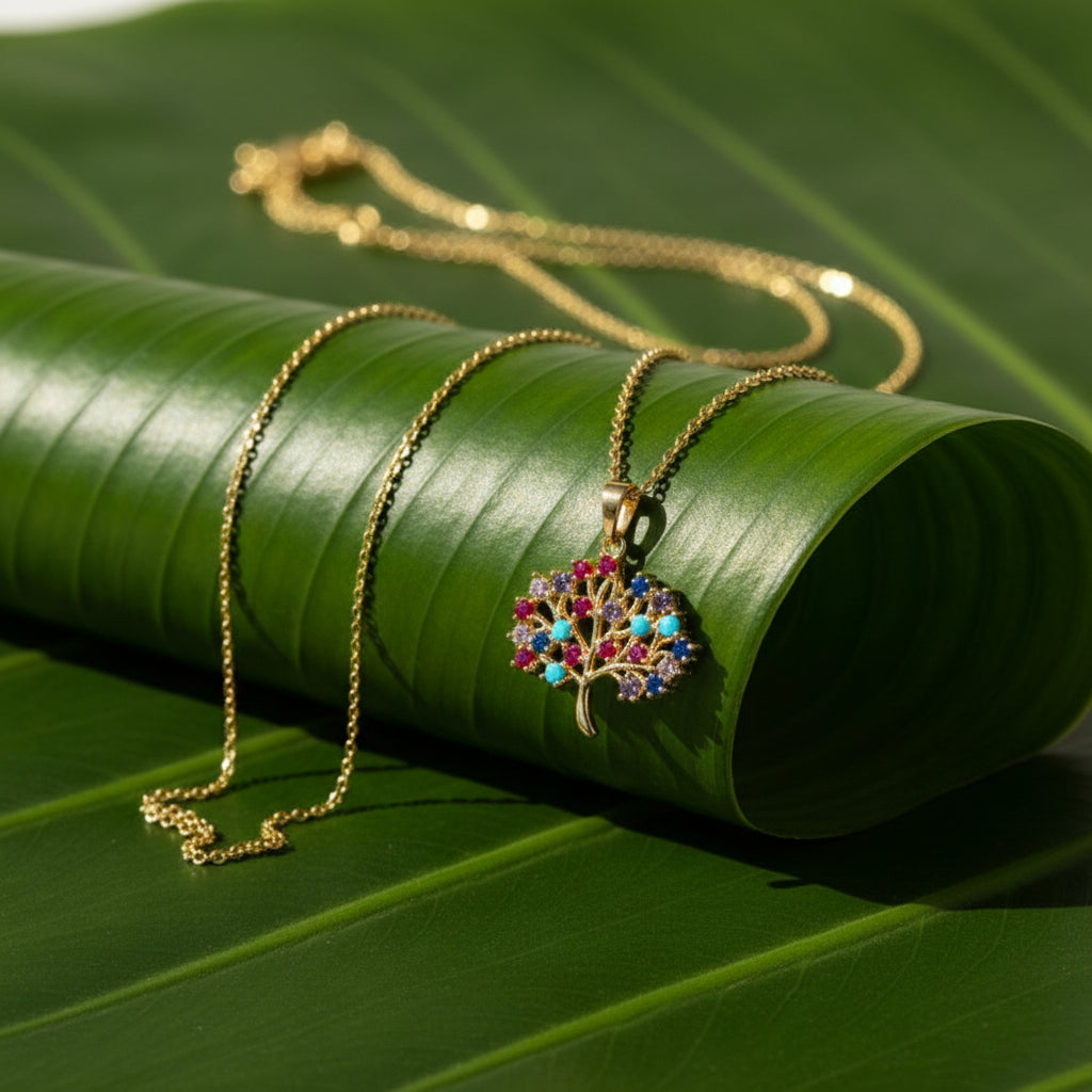 SVORA gold plated stainless steel necklace with a multicolor Tree of Life pendant featuring amber, blue, turquoise, and amethyst CZ stones.