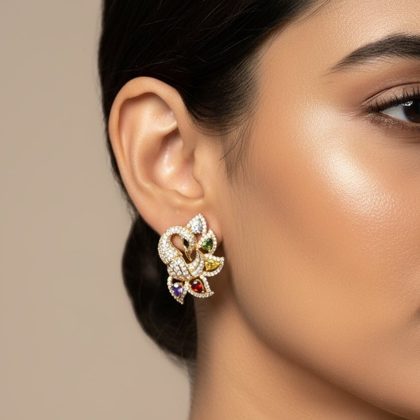 SVORA gold-tone peacock stud earrings with multicolour cubic zirconia stones.