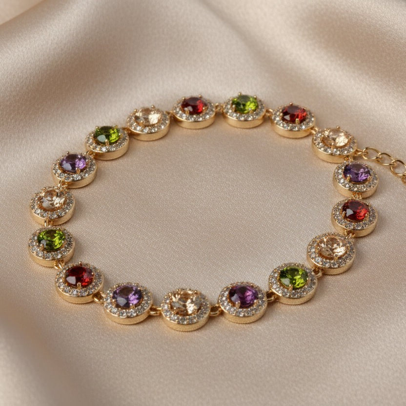 SVORA multicolour round tennis bracelet with halo cubic zirconia stones in rose gold plating.