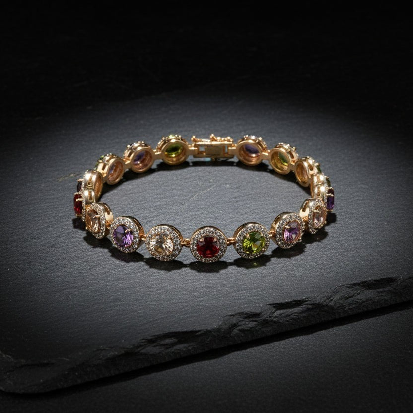 SVORA multicolour round tennis bracelet with halo links in rose gold, featuring garnet, peridot, amethyst, and peach champagne stones.