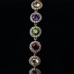 SVORA multicolour round tennis bracelet with halo of white cubic zirconia, rose gold plated stainless steel.