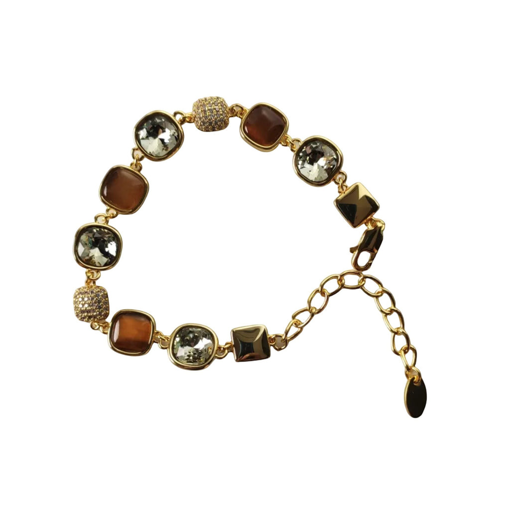SVORA Noir Mocha Gemstone Adjustable Bracelet with gold-tone finish, featuring mocha-toned stones, smoky crystal accents, and black faceted details.