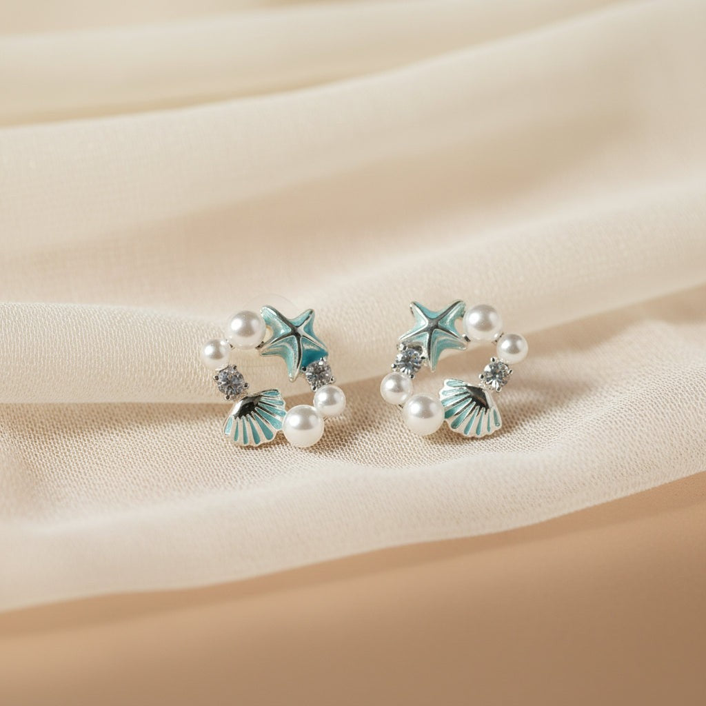 SVORA Ocean Cluster Pearl Stud Earrings with aqua starfish, shell, pearls, and crystals. Gold tone.