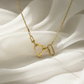 SVORA gold-tone stainless steel open heart rope statement necklace with toggle clasp. Waterproof and anti-tarnish.