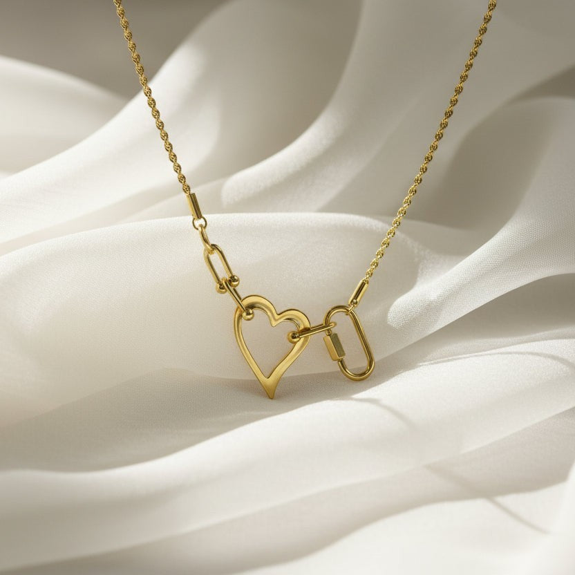SVORA gold-tone stainless steel open heart rope statement necklace with toggle clasp. Waterproof and anti-tarnish.