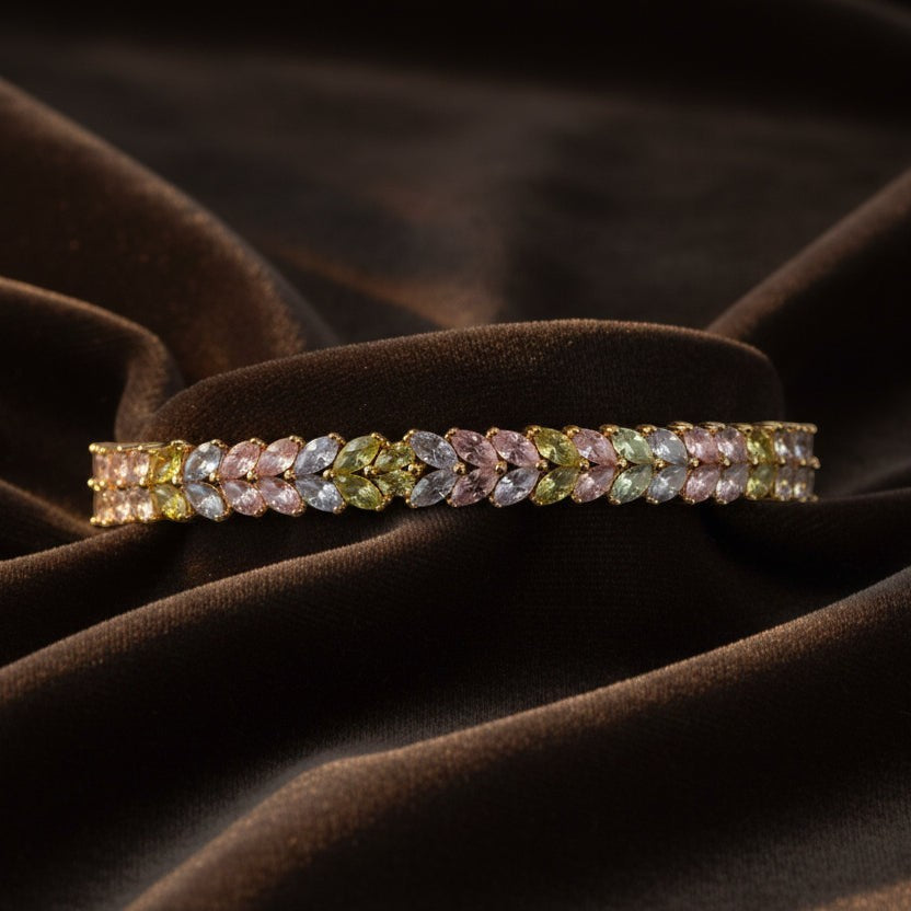 SVORA double row pastel marquise CZ tennis bracelet in pink, lavender, and mint on gold-plated stainless steel.