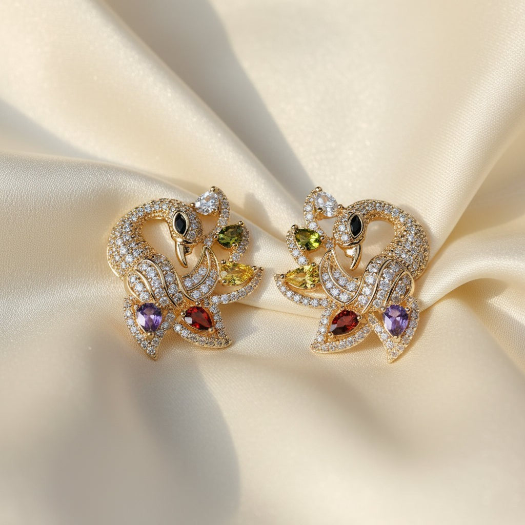 SVORA gold-tone peacock stud earrings with multicolour cubic zirconia stones.