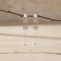 SVORA pearl stud rose drop dangler earrings with pink butterfly clusters and cubic zirconia, 18K gold tone.
