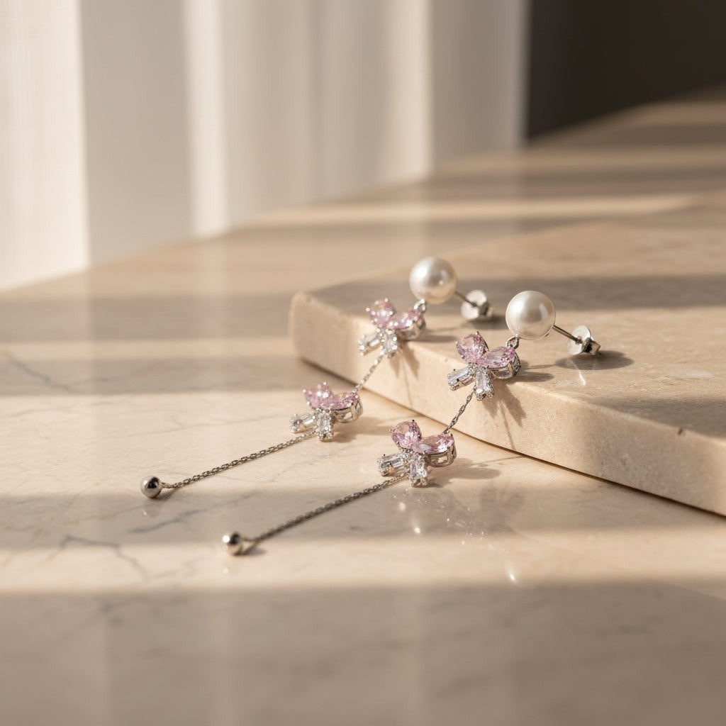 SVORA pearl stud rose drop dangler earrings with pink butterfly clusters and cubic zirconia.