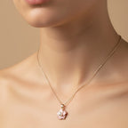 SVORA pink enamel pearl flower necklace with 18k gold-plated stainless steel chain.