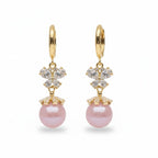 SVORA pink pearl butterfly dangle earrings with gold hoops and clear crystals.