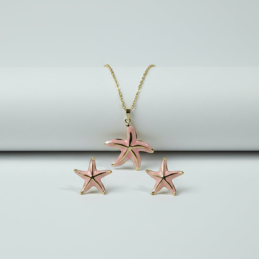 SVORA pink enamel starfish necklace and matching earrings with gold trim, stainless steel, 18K gold tone plating.