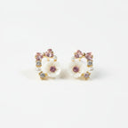 SVORA rose pearl bow stud earrings with pink crystals, mother-of-pearl florets, and cubic zirconia accents.