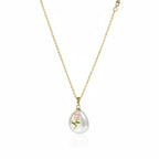 SVORA gold chain necklace with a white baroque pearl pendant featuring a pink rose and green leaves design.
