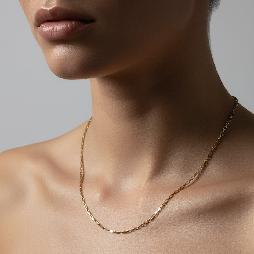 SVORA gold-tone stainless steel sleek chain necklace on a model, waterproof and anti-tarnish