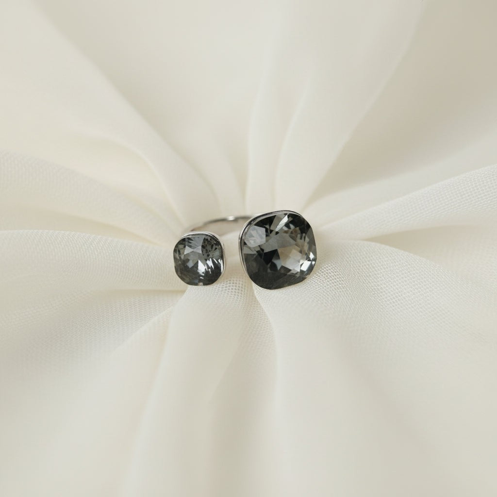 SVORA Toi et Moi ring with two cushion-cut smoky topaz stones on a silver band. Adjustable.