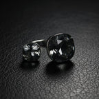 SVORA Toi et Moi ring with two cushion-cut smoky topaz stones on a silver-tone stainless steel band.