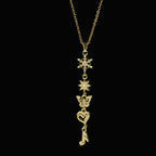 SVORA gold plated stainless steel necklace with snowflake, star, butterfly, heart, and music note charms.