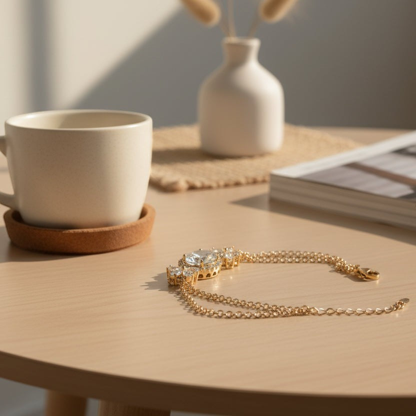 SVORA Solitaire Oval Layered Bracelet with white CZ stones and rose gold plated chain, perfect for bridal or evening wear.