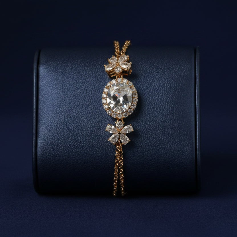 SVORA Solitaire Oval Layered Bracelet with white CZ center, halo, and flower accents on rose gold chain.