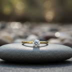SVORA Lumiere Whisper Solitaire Ring in gold-tone stainless steel with cubic zirconia. Simple, elegant, and stackable.