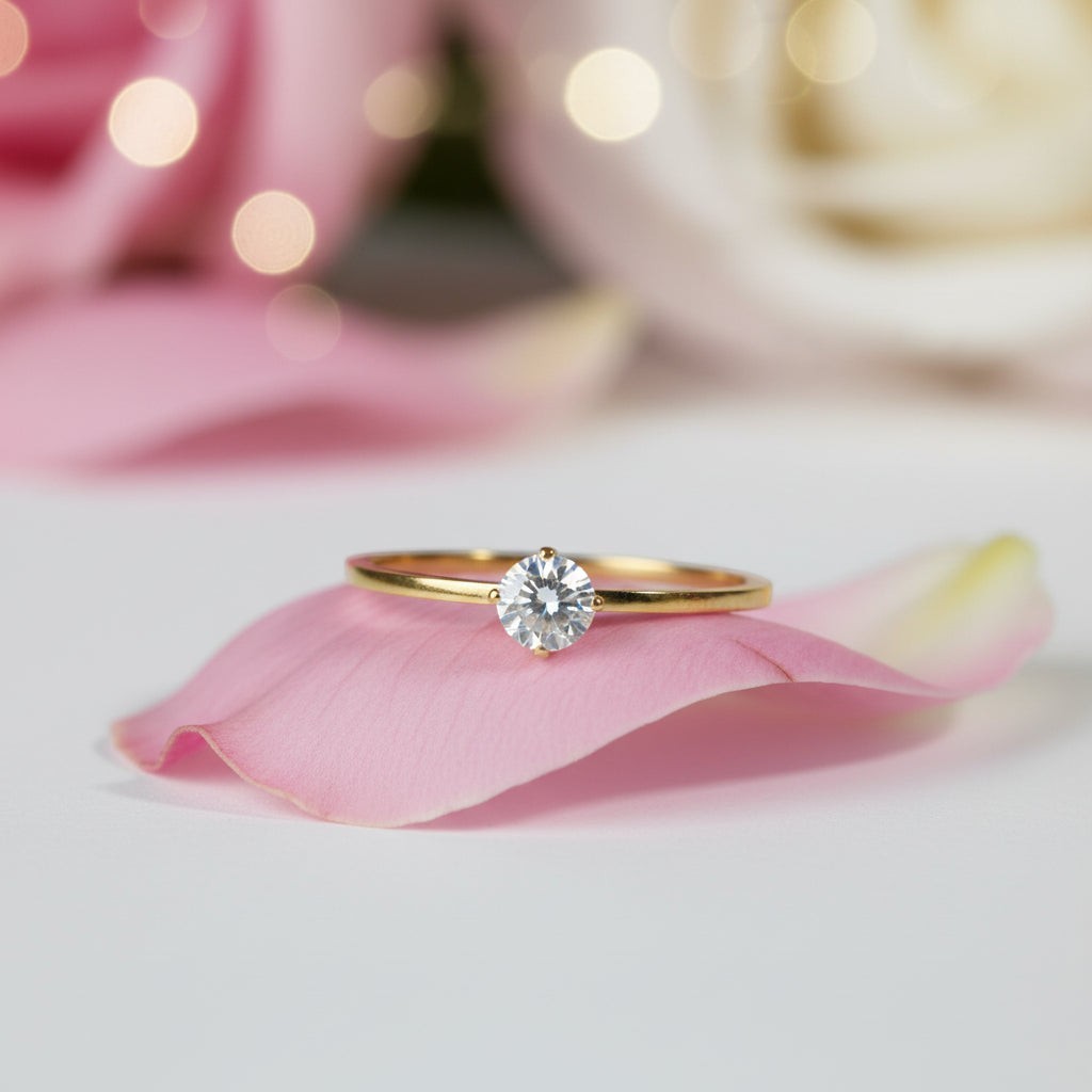 SVORA Lumiere Whisper Solitaire Ring in gold-tone stainless steel with a crystal white cubic zirconia.