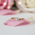 SVORA Lumiere Whisper Solitaire Ring in gold-tone stainless steel with a crystal white cubic zirconia.