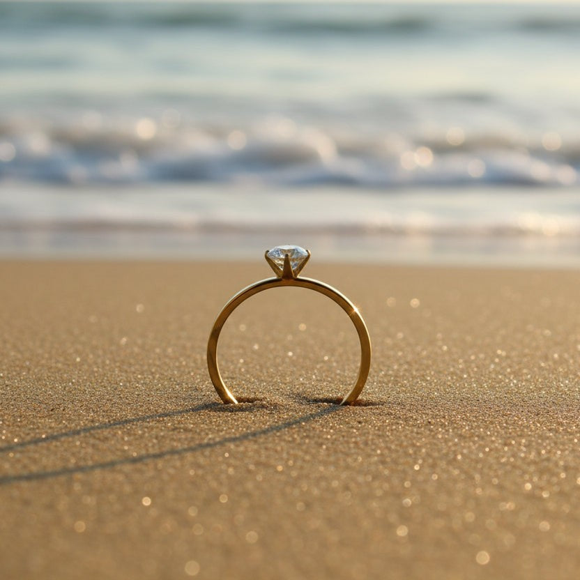 SVORA Lumiere Whisper Solitaire Ring in gold-tone stainless steel with a crystal white cubic zirconia.