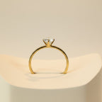 SVORA Lumiere Whisper Solitaire Ring in gold-tone stainless steel with a crystal white cubic zirconia.