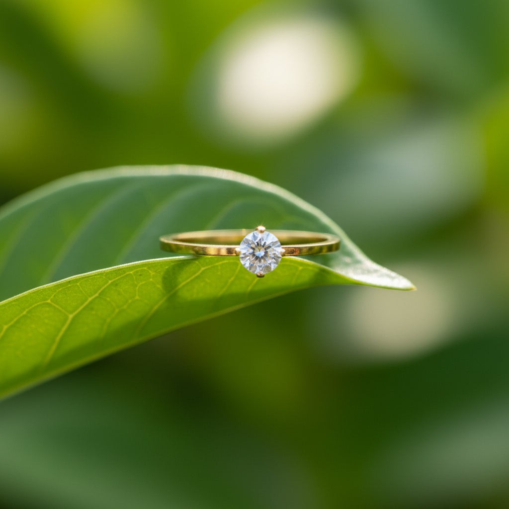 SVORA Lumiere Whisper Solitaire Ring in gold-tone stainless steel with a crystal white cubic zirconia.