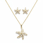 SVORA white enamel starfish necklace and earrings set with gold edges. Coastal jewelry.