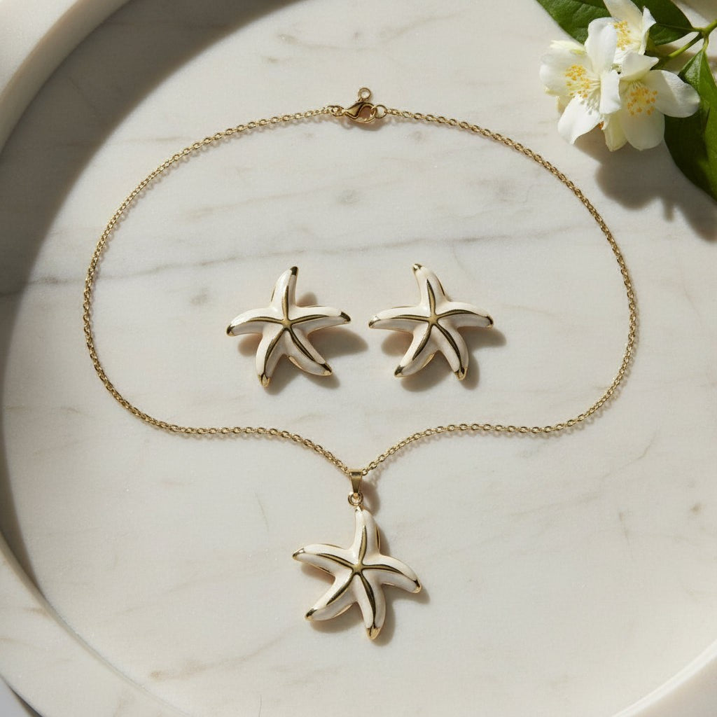 SVORA white enamel starfish necklace and earrings set with gold edges, 18K gold tone plating.