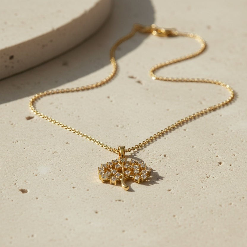 SVORA gold Tree of Life necklace with white CZ stones, 18K gold plated stainless steel.
