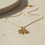 SVORA gold Tree of Life necklace with white CZ stones, 18K gold plated stainless steel.