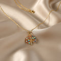 SVORA gold Tree of Life necklace with multicolor CZ stones on a delicate chain. Waterproof and anti-tarnish.