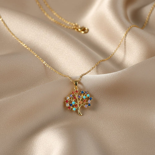 SVORA gold Tree of Life necklace with multicolor CZ stones on a delicate chain. Waterproof and anti-tarnish.