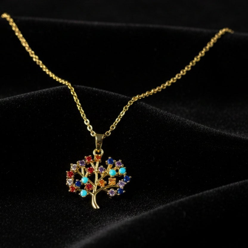 SVORA gold plated stainless steel necklace with a multicolor Tree of Life pendant adorned with amber, blue, turquoise, and amethyst CZ stones.