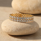 SVORA gold-plated stainless steel twin row crystal tennis bracelet with white CZ stones and fold-over clasp.