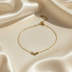 SVORA gold plated stainless steel chain bracelet with three small openwork circles, adjustable lobster clasp.