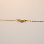 SVORA gold plated stainless steel Whisper Circle Chain Bracelet with three openwork circles.