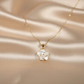 SVORA white enamel pearl flower necklace with gold chain, elegant floral pendant with pearl center.