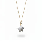 SVORA white enamel pearl flower necklace with a gold chain. Delicate floral pendant with a faux pearl center.