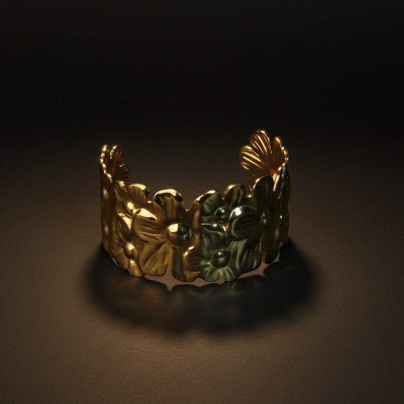 SVORA Wild Garden Cuff Bracelet, 18K gold plated stainless steel with floral design. Adjustable and hypoallergenic.