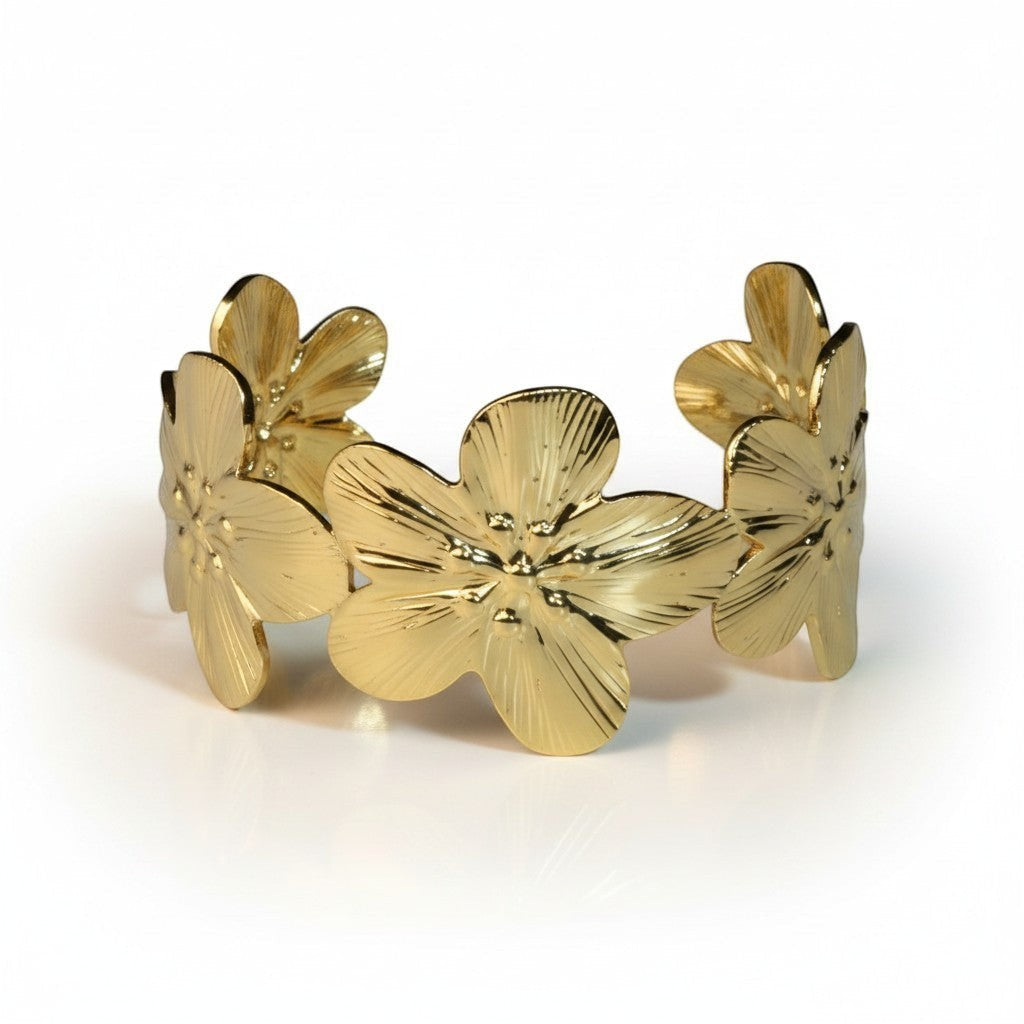 SVORA Wildbloom Cuff Bracelet, gold-plated stainless steel with sculpted flower details, adjustable.