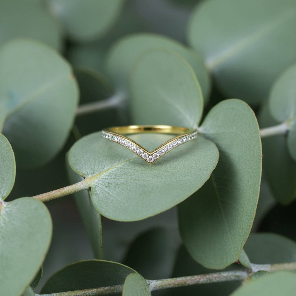 SVORA Lumiere Wishbone V-Band Ring, 18K gold plated stainless steel with small clear stones, designed for stacking.