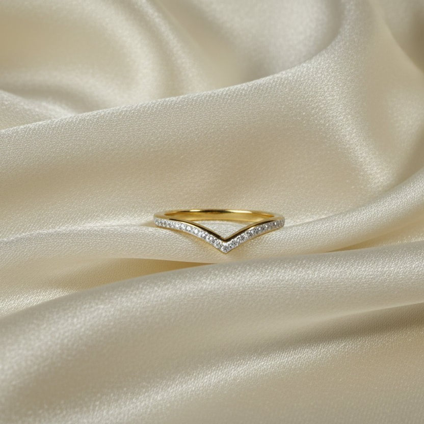 SVORA Lumiere Wishbone V-Band Ring, 18K gold plated stainless steel with small white stones, designed for stacking.